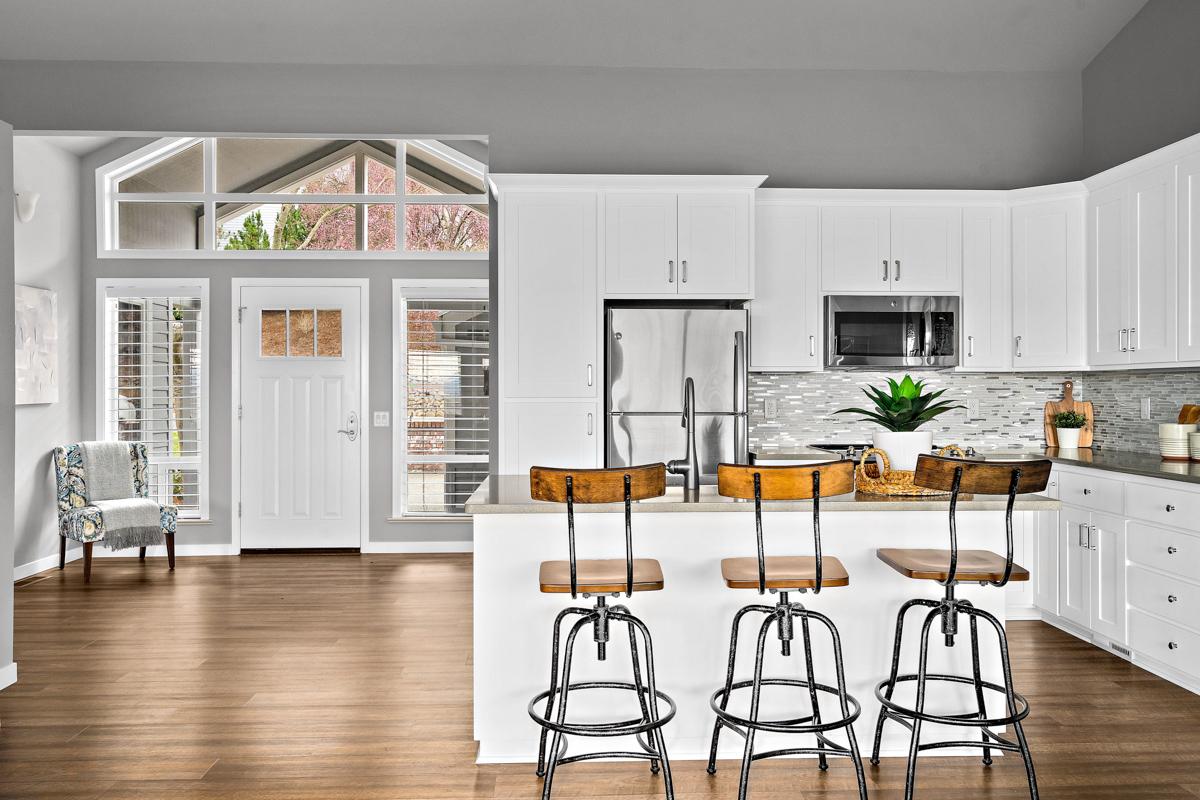 Photo of a kitchen and living space in a Rogue Valley Manor residence.